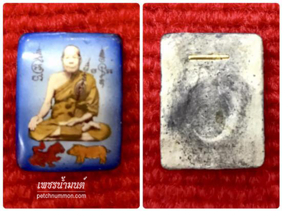 รูปล๊อตเก็ตหลังฝังตะกรุดทองคำหลวงพ่อมี วัดมารวิชัย จ.อยุธยา รุ่นสิงห์ป้อนเหยื่อ ปี 2538